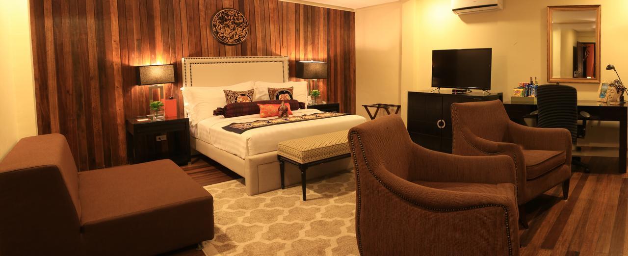 The Oriental Luxury Suites Alfonso Rum bild