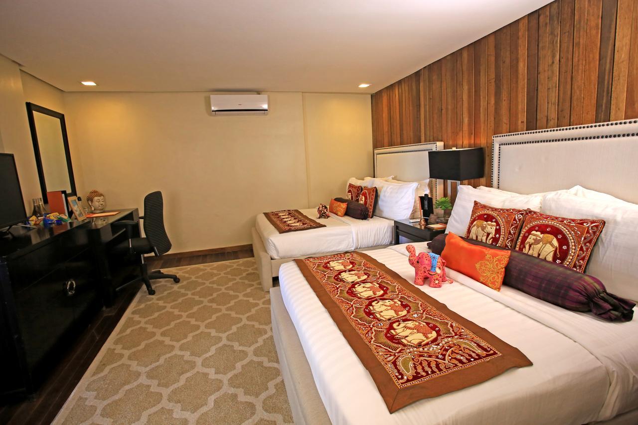 The Oriental Luxury Suites Alfonso Rum bild